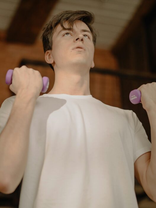 mid 20's man working out in bedroom