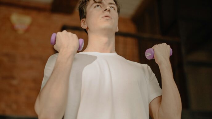 mid 20's man working out in bedroom